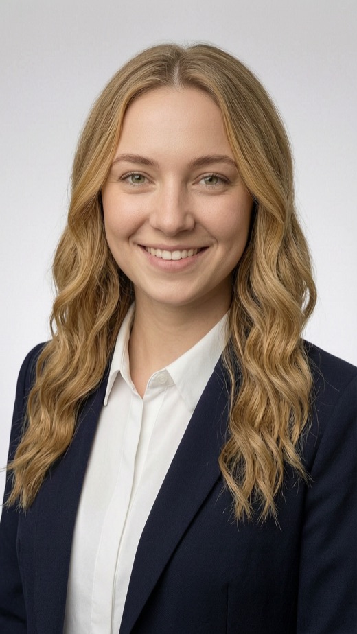The same woman as a professional headshot